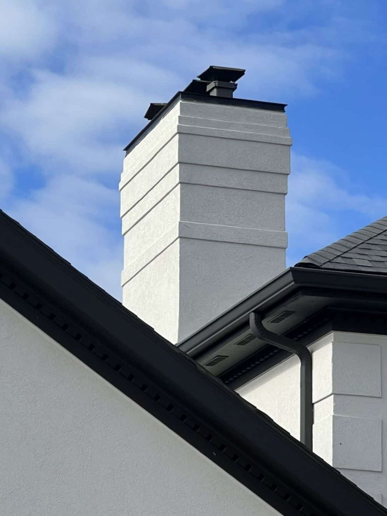 AFTER - EIFS Chimney repair and bird hole repair in Carmel Indiana