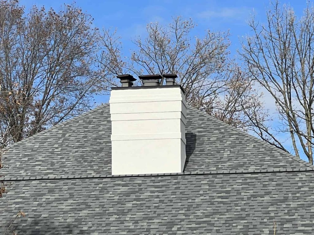 AFTER - eifs chimney repair bird hole repair Carmel Indiana Walker Residence