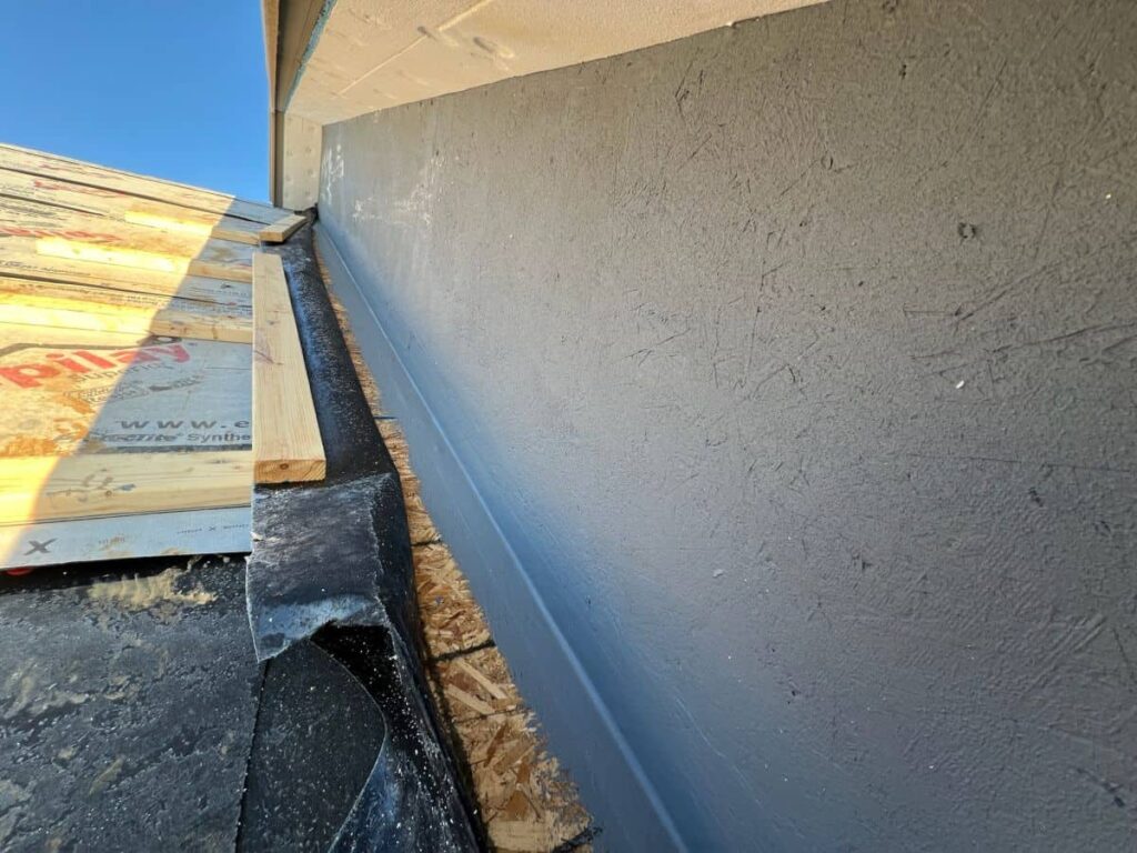 Coat the exterior OSB wall sheathing with the same liquid-applied barrier