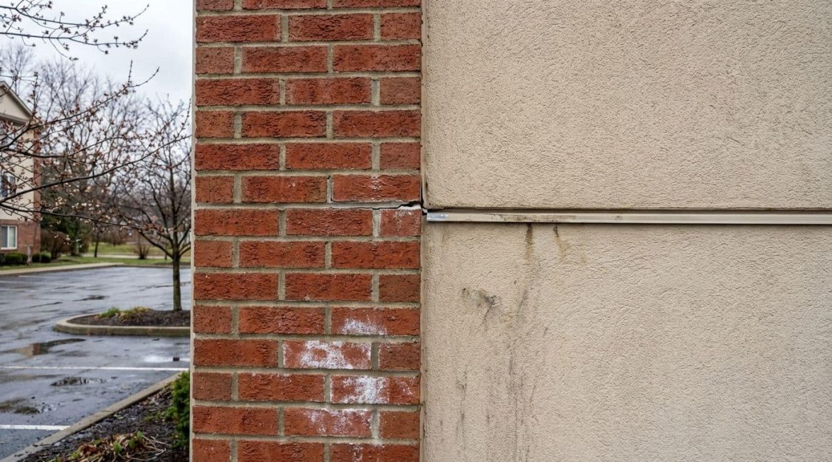 Where Brick Meets EIFS - Spring Tuckpointing Issues Leak Red Flags