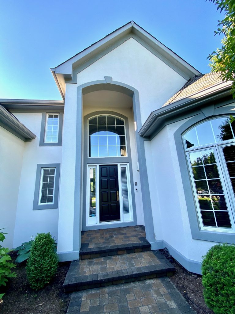 Blue EIFS Stucco Archway, Molding, and Walls. Completed project in Zionsville, Indiana